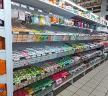 Store shelving filled with different soaps